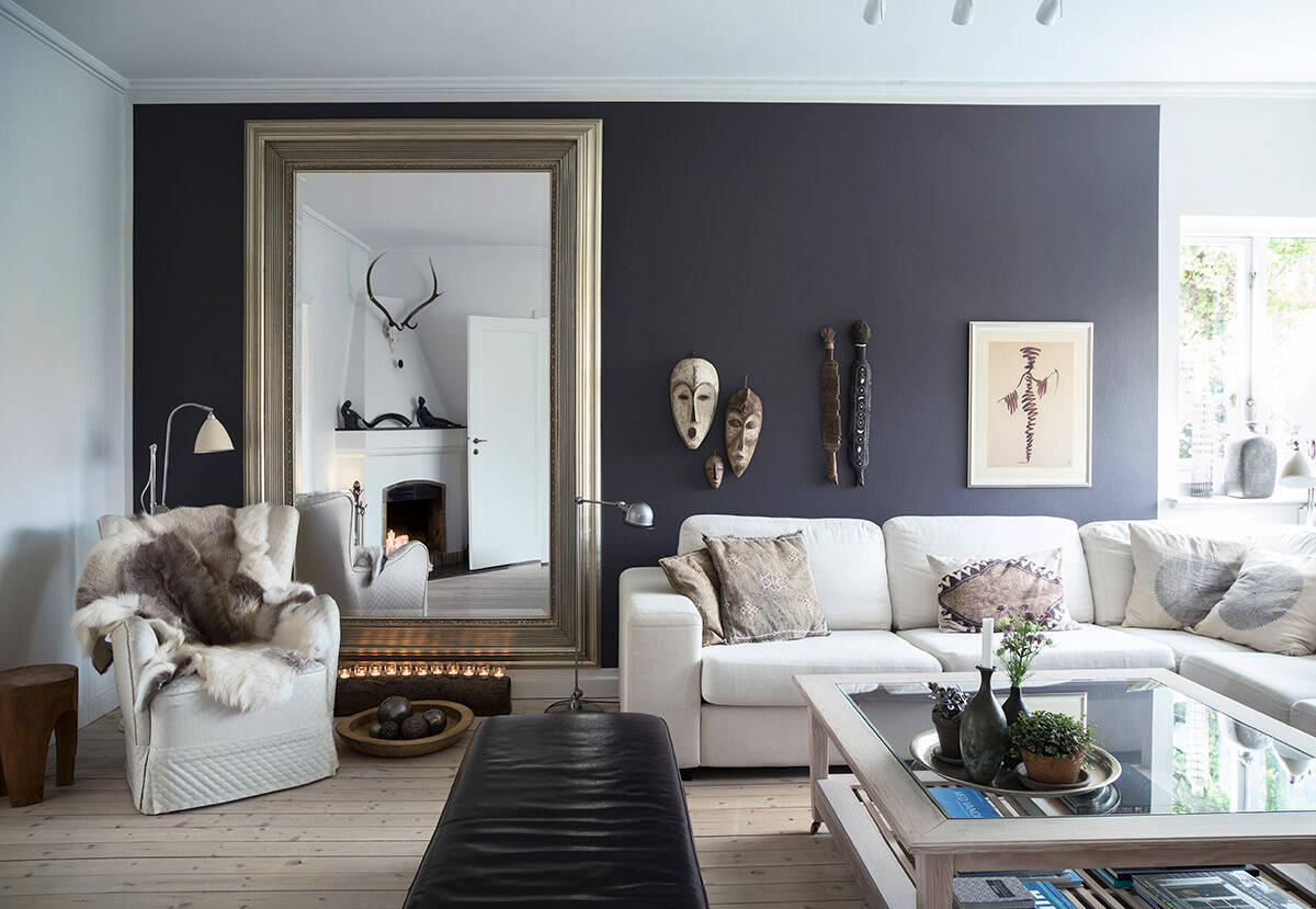 Inredarens eget hem är fyllt med kontraster och konst – så får du stilen